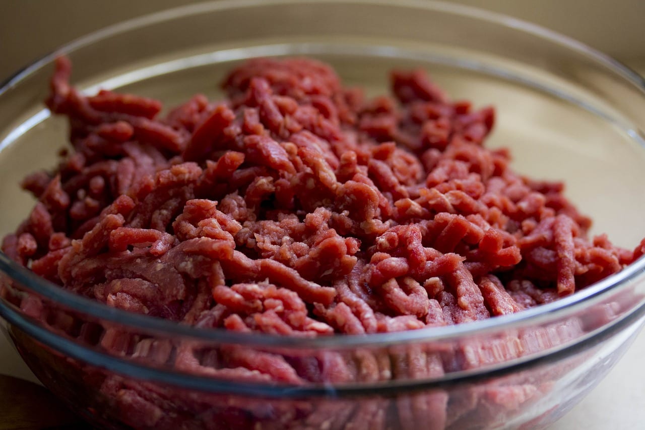 Glass bowl with raw ground beef