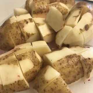 Diced potatoes on a cutting board